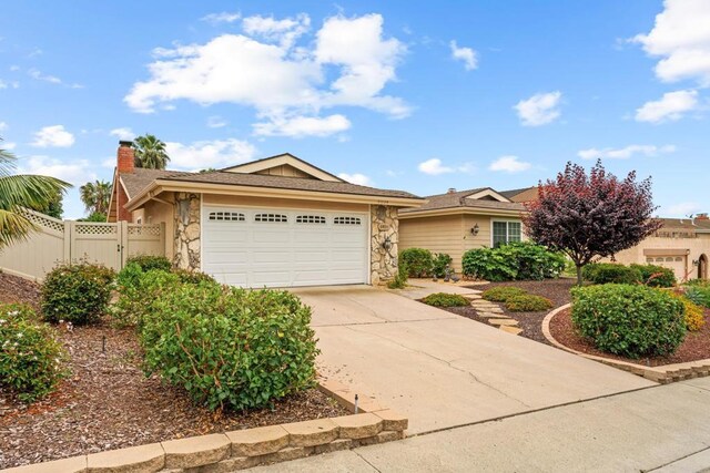 6034 Wenrich Dr, San Diego, CA 92120 - single story home featuring an attached garage, stone siding, concrete driveway, a chimney, and a gate