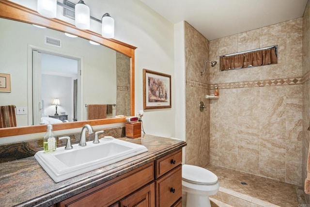 6034 Wenrich Dr, San Diego, CA 92120 - bathroom featuring a tile shower and vanity