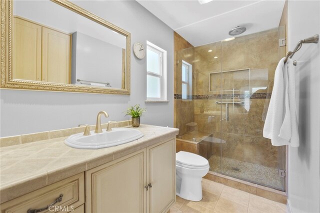 21845 Tumbleweed Cir, Lake Forest, CA 92630 - full bath with vanity, a shower stall, and tile patterned flooring