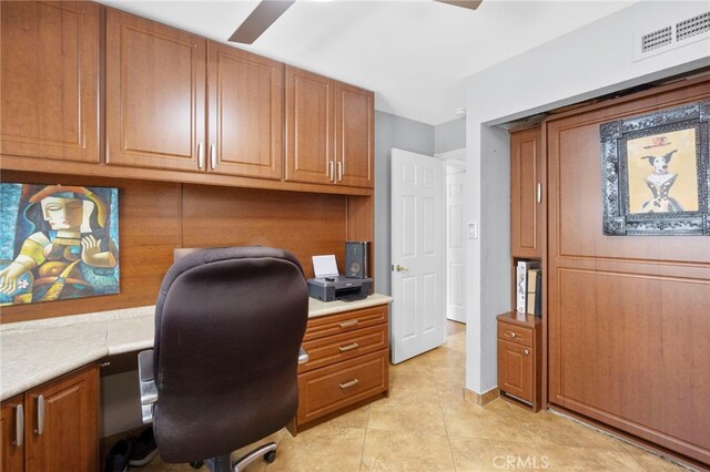 21845 Tumbleweed Cir, Lake Forest, CA 92630 - office with built in study area and light tile patterned floors