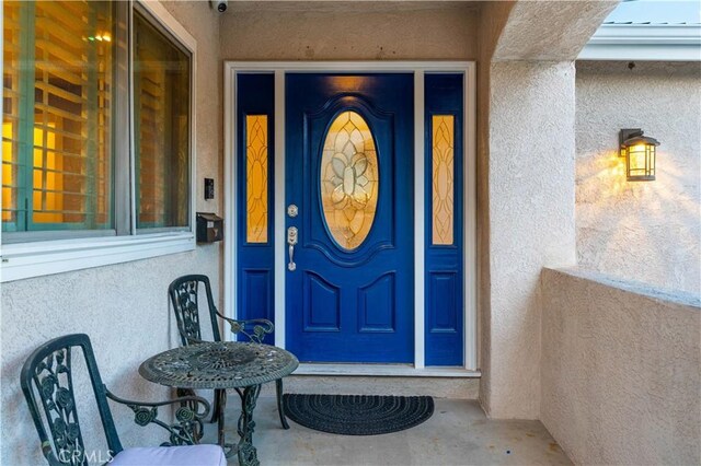 13837 Sylvan St, Valley Glen, CA 91401 - doorway to property with stucco siding