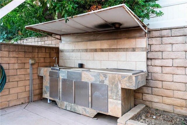 13837 Sylvan St, Valley Glen, CA 91401 - view of patio / terrace with exterior kitchen and a sink
