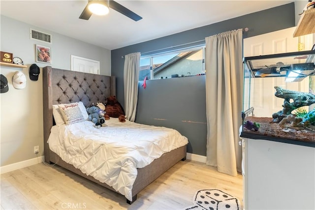 13837 Sylvan St, Valley Glen, CA 91401 - bedroom with light wood finished floors and ceiling fan