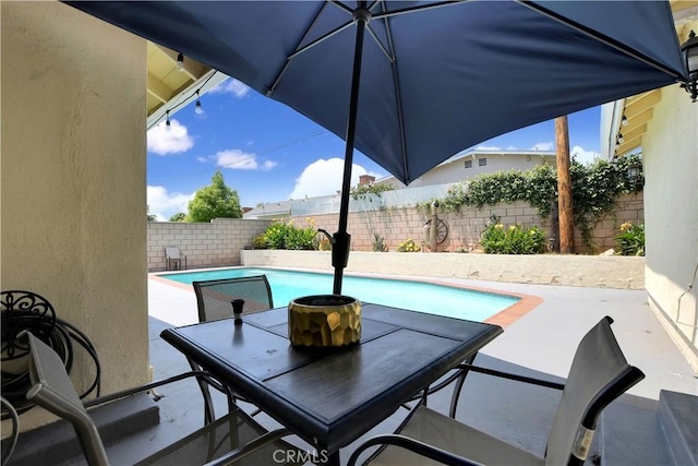 1305 E Eckerman Ave, West Covina, CA 91790 - fenced backyard featuring a patio and outdoor dining space
