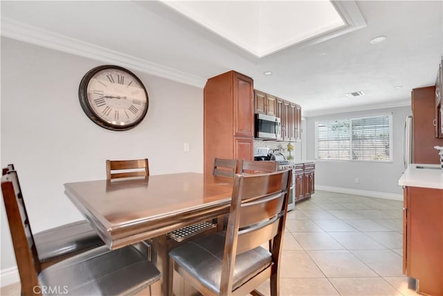 1305 E Eckerman Ave, West Covina, CA 91790 - dining area featuring ornamental molding, light tile patterned flooring, and recessed lighting