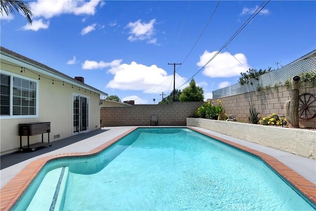 1305 E Eckerman Ave, West Covina, CA 91790 - view of swimming pool featuring a fenced backyard and a patio area