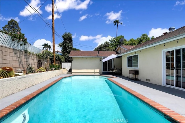 1305 E Eckerman Ave, West Covina, CA 91790 - view of pool with a fenced backyard and a patio