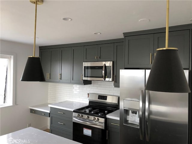 200 39th St, Manhattan Beach, CA 90266 - kitchen with stainless steel appliances, backsplash, light countertops, gray cabinets, and recessed lighting