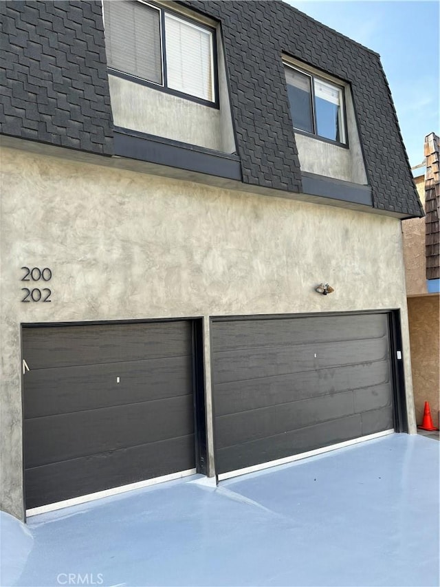 200 39th St, Manhattan Beach, CA 90266 - garage featuring concrete driveway