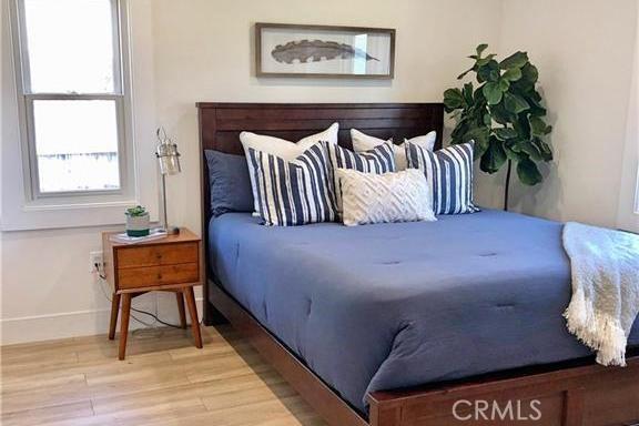 341 W Whiting Ave, Fullerton, CA 92832 - bedroom with wood finished floors and baseboards