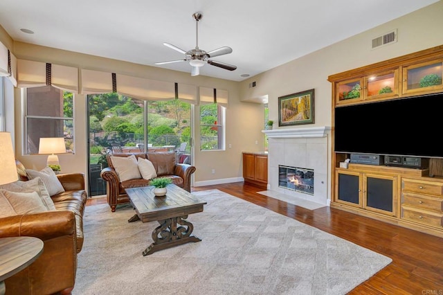 282 Camino Del Postigo, Escondido, CA 92029 - living area with ceiling fan, wood finished floors, and a fireplace