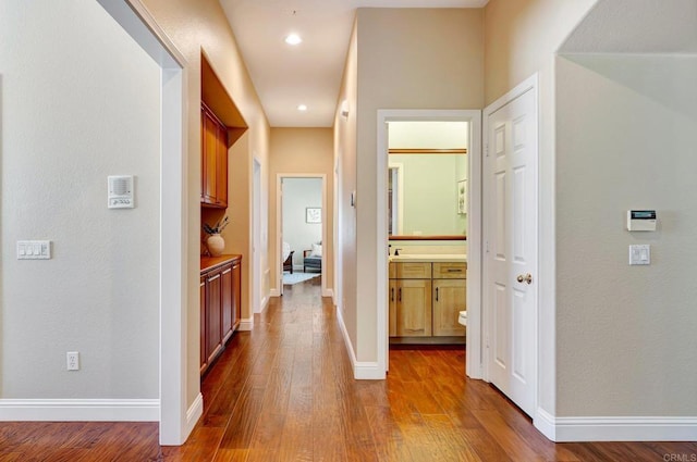 282 Camino Del Postigo, Escondido, CA 92029 - hallway featuring wood finished floors and recessed lighting