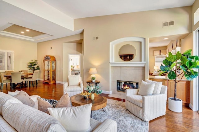 282 Camino Del Postigo, Escondido, CA 92029 - living area with wood finished floors, a tiled fireplace, and recessed lighting