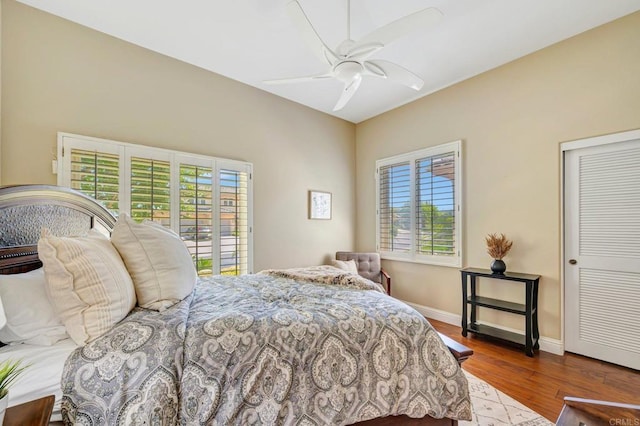 282 Camino Del Postigo, Escondido, CA 92029 - bedroom with multiple windows, wood finished floors, and a ceiling fan