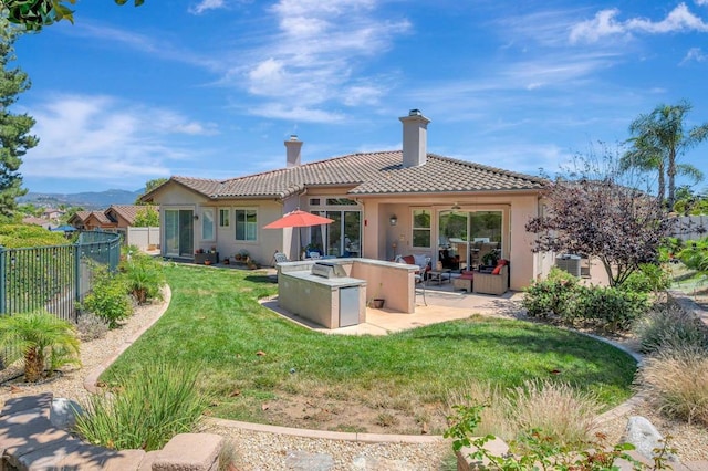 282 Camino Del Postigo, Escondido, CA 92029 - rear view of house with stucco siding, a patio, a tiled roof, a chimney, and ceiling fan