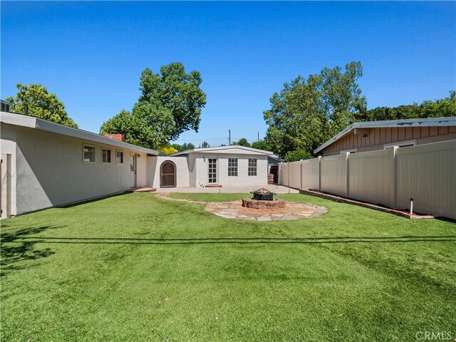 27545 Santa Clarita Rd, Saugus, CA 91350 - view of yard featuring a fire pit and a patio