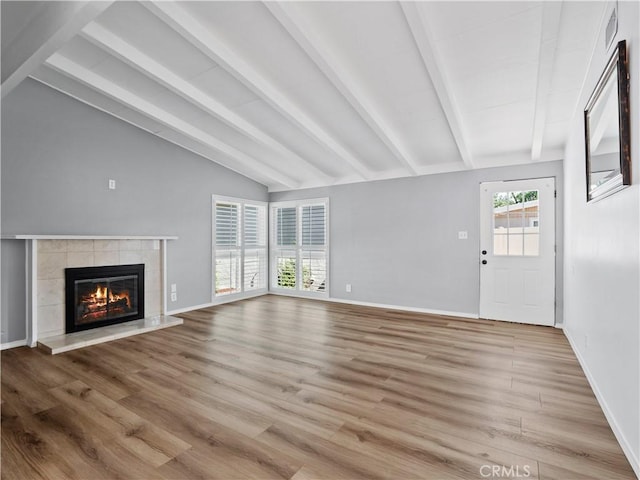 27545 Santa Clarita Rd, Saugus, CA 91350 - unfurnished living room featuring a fireplace and wood finished floors