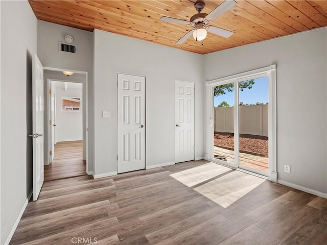 27545 Santa Clarita Rd, Saugus, CA 91350 - unfurnished bedroom featuring wooden ceiling, access to outside, wood finished floors, and ceiling fan