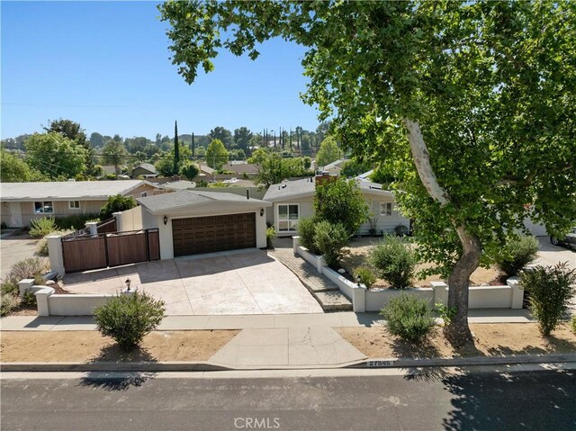 27545 Santa Clarita Rd, Saugus, CA 91350 - view of front facade featuring driveway and a garage