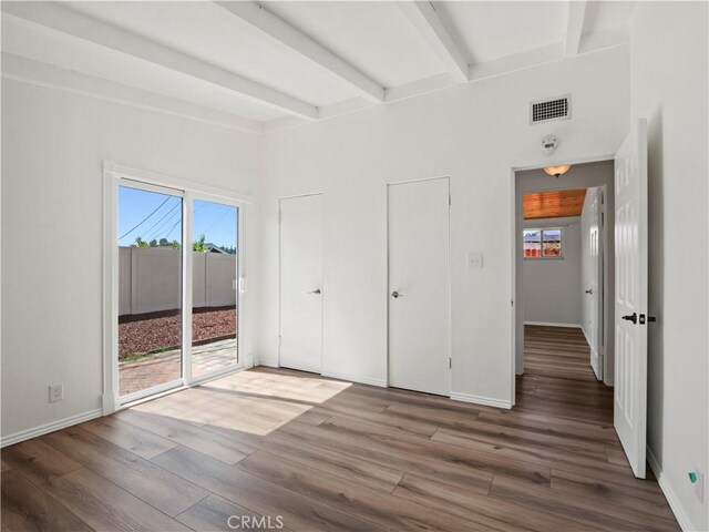 27545 Santa Clarita Rd, Saugus, CA 91350 - unfurnished bedroom with access to outside, wood finished floors, and beam ceiling