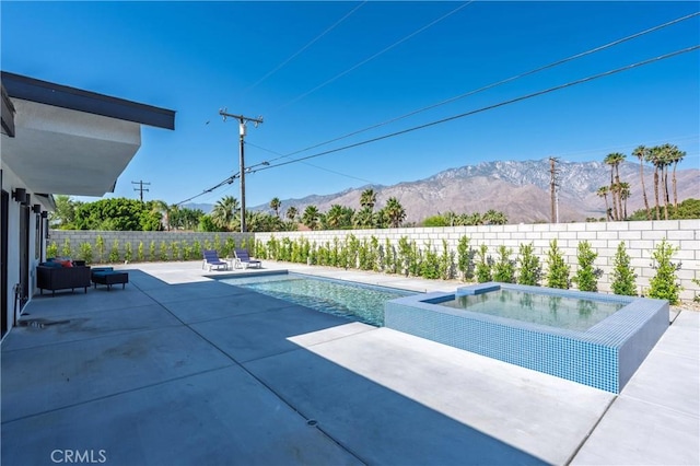 2901 N Biskra Rd, Palm Springs, CA 92262 - view of pool featuring a mountain view, a patio area, and a fenced backyard