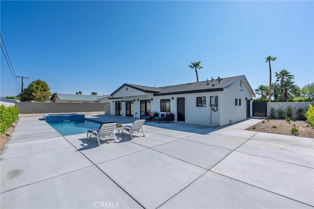 2901 N Biskra Rd, Palm Springs, CA 92262 - back of property featuring a patio area, a fenced backyard, and stucco siding