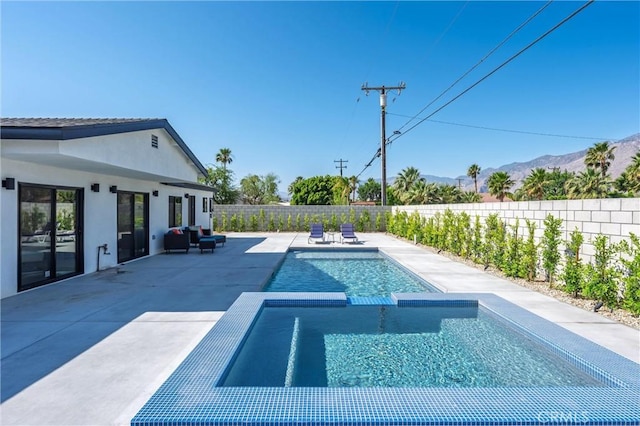 2901 N Biskra Rd, Palm Springs, CA 92262 - view of swimming pool with a fenced backyard, a patio, a mountain view, and a pool with connected hot tub