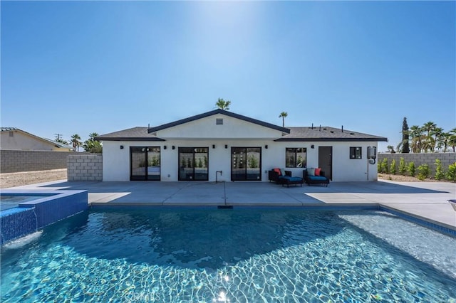 2901 N Biskra Rd, Palm Springs, CA 92262 - back of property with an outdoor hot tub, stucco siding, and a patio