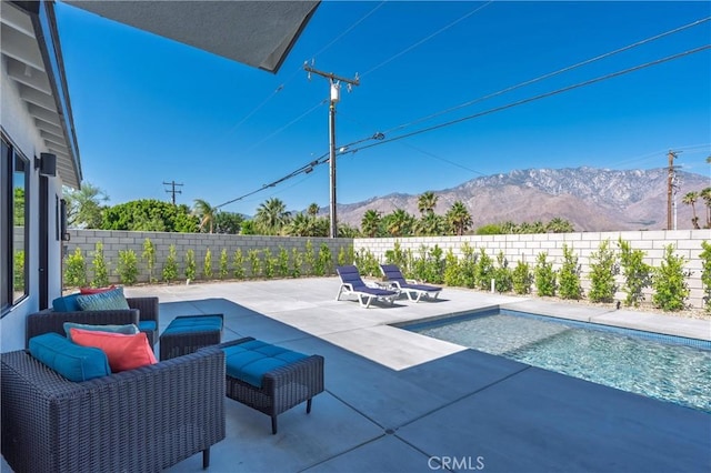2901 N Biskra Rd, Palm Springs, CA 92262 - view of swimming pool featuring a mountain view, a fenced backyard, and a patio area