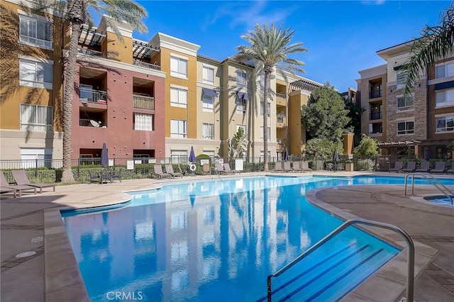 24545 Town Center Dr Unit 5405, Valencia, CA 91355 - community pool featuring a patio area