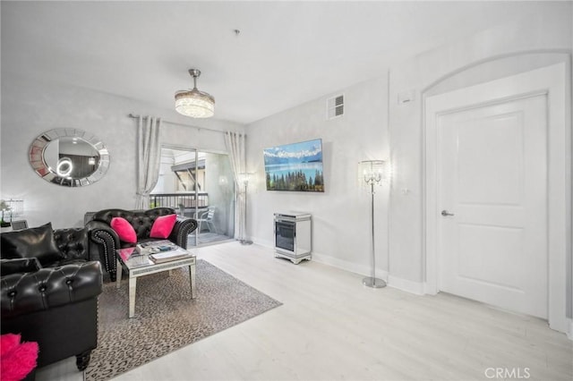 24545 Town Center Dr Unit 5405, Valencia, CA 91355 - living area featuring wood finished floors and baseboards