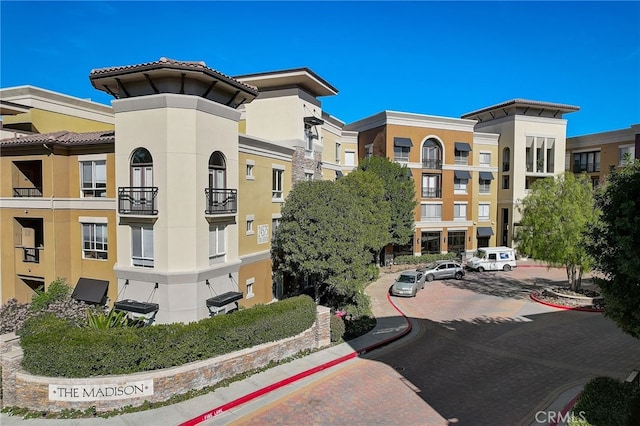 24545 Town Center Dr Unit 5405, Valencia, CA 91355 - view of apartment building / complex