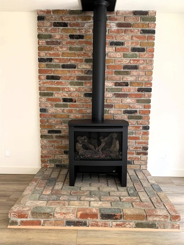 1878 Wolviston Way, San Diego, CA 92154 - detailed view of a wood stove and wood finished floors