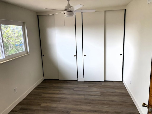 1878 Wolviston Way, San Diego, CA 92154 - unfurnished bedroom with dark wood-style floors and a ceiling fan