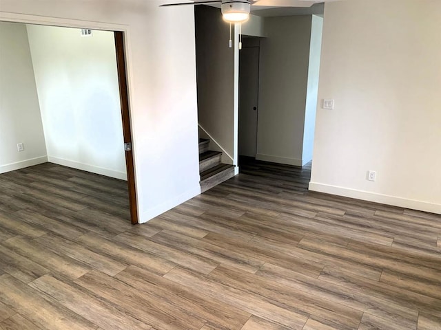 1878 Wolviston Way, San Diego, CA 92154 - spare room featuring ceiling fan, dark wood-style flooring, and stairway