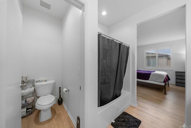 1711 Cal Orchid Pl Unit 1, Chula Vista, CA 91913 - full bath with wood finished floors and shower / bath combination with curtain
