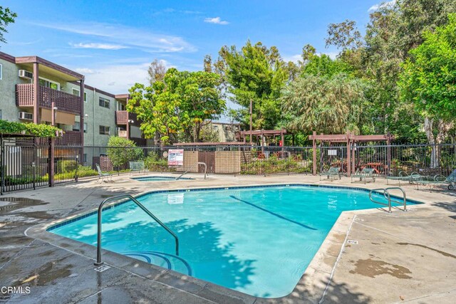 5870 Benner St Unit 102, Los Angeles, CA 90042 - community pool with a community hot tub and a patio area
