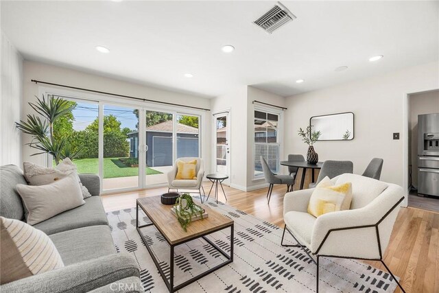 17139 Strathern St, Van Nuys, CA 91406 - living area featuring recessed lighting and light wood-style floors