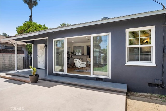 17139 Strathern St, Van Nuys, CA 91406 - rear view of house featuring stucco siding and a patio