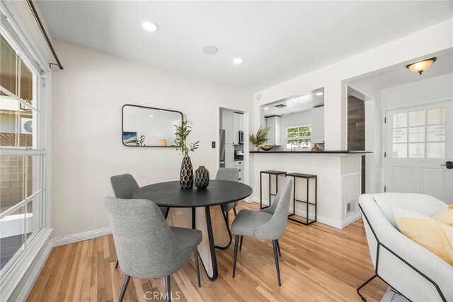 17139 Strathern St, Van Nuys, CA 91406 - dining space with light wood-style floors and recessed lighting