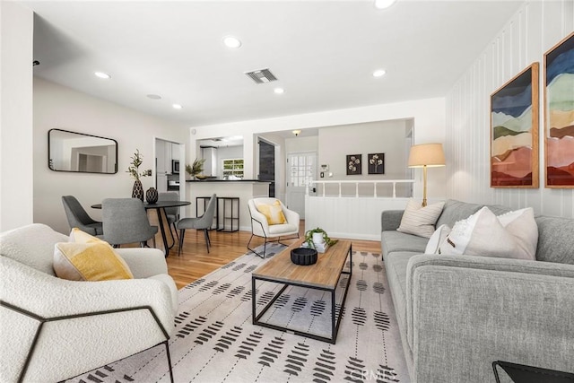 17139 Strathern St, Van Nuys, CA 91406 - living area featuring wood finished floors and recessed lighting
