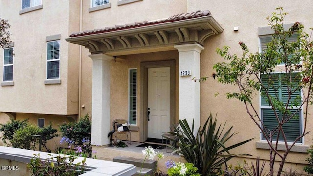 1239 Bayside Ln, Oxnard, CA 93035 - doorway to property featuring stucco siding