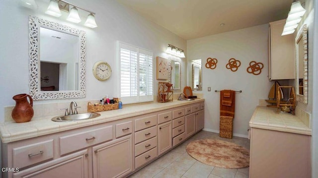 1239 Bayside Ln, Oxnard, CA 93035 - bathroom with double vanity and tile patterned floors