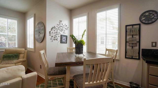 1239 Bayside Ln, Oxnard, CA 93035 - dining space with baseboards and wood finished floors