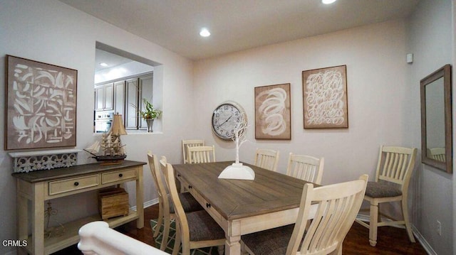 1239 Bayside Ln, Oxnard, CA 93035 - dining room with dark wood finished floors and recessed lighting