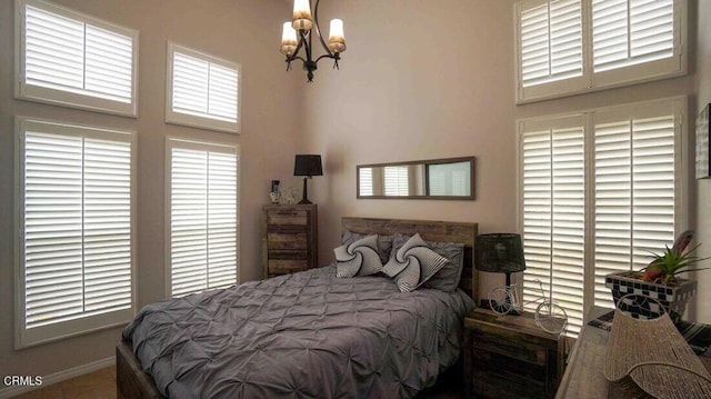 1239 Bayside Ln, Oxnard, CA 93035 - bedroom with a chandelier and baseboards