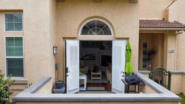 1239 Bayside Ln, Oxnard, CA 93035 - doorway to property with stucco siding and a tiled roof