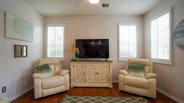 1239 Bayside Ln, Oxnard, CA 93035 - living area with healthy amount of natural light, a ceiling fan, and wood finished floors