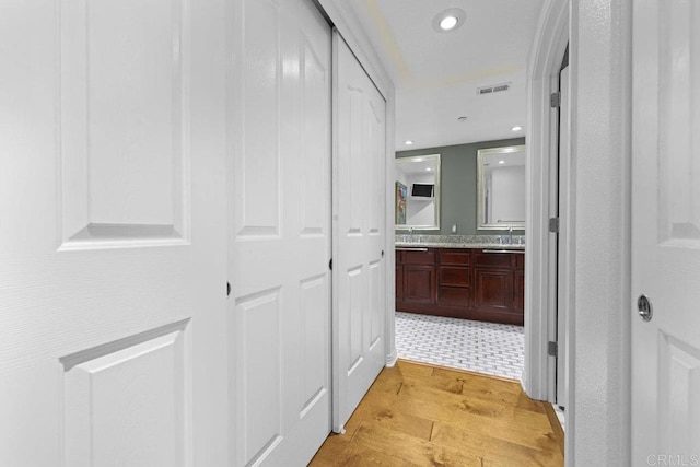 301 W G St Unit 119, San Diego, CA 92101 - corridor with light wood-style floors and recessed lighting