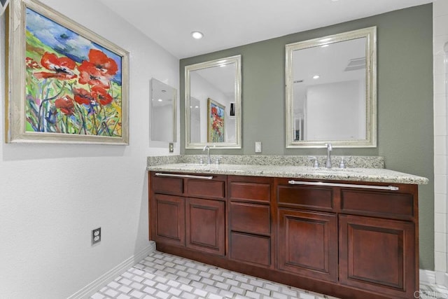 301 W G St Unit 119, San Diego, CA 92101 - bathroom featuring double vanity and recessed lighting
